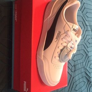 Size 10 white and black pumas